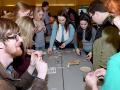 makers surrounding a table