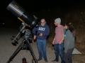 volunteer with telescope