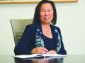 judy sakaki at her desk