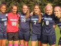 women's soccer team posing for photo