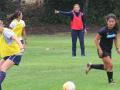 Seventh-year head coach Emiria Salzmann Dunn instructs players during Tuesday's training session.