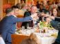 Attendees toast at the dinner.