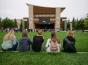 Students watch the eclipse on the big screen outside Weill Hall